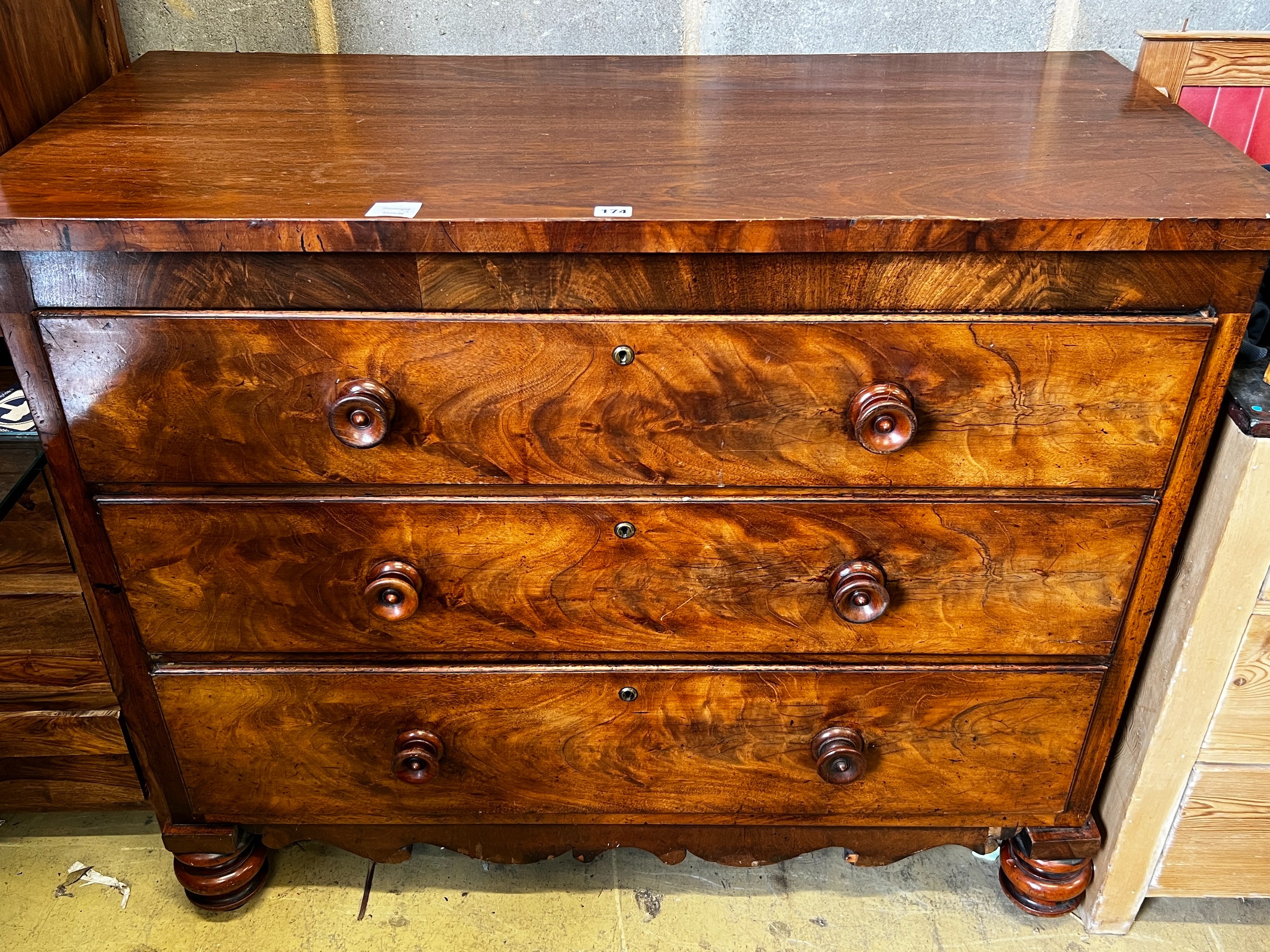 A Victorian mahogany chest of three drawers, width 116cm, depth 56cm, height 97cm